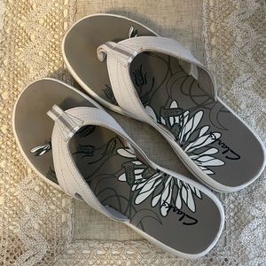 Clark’s flip flops